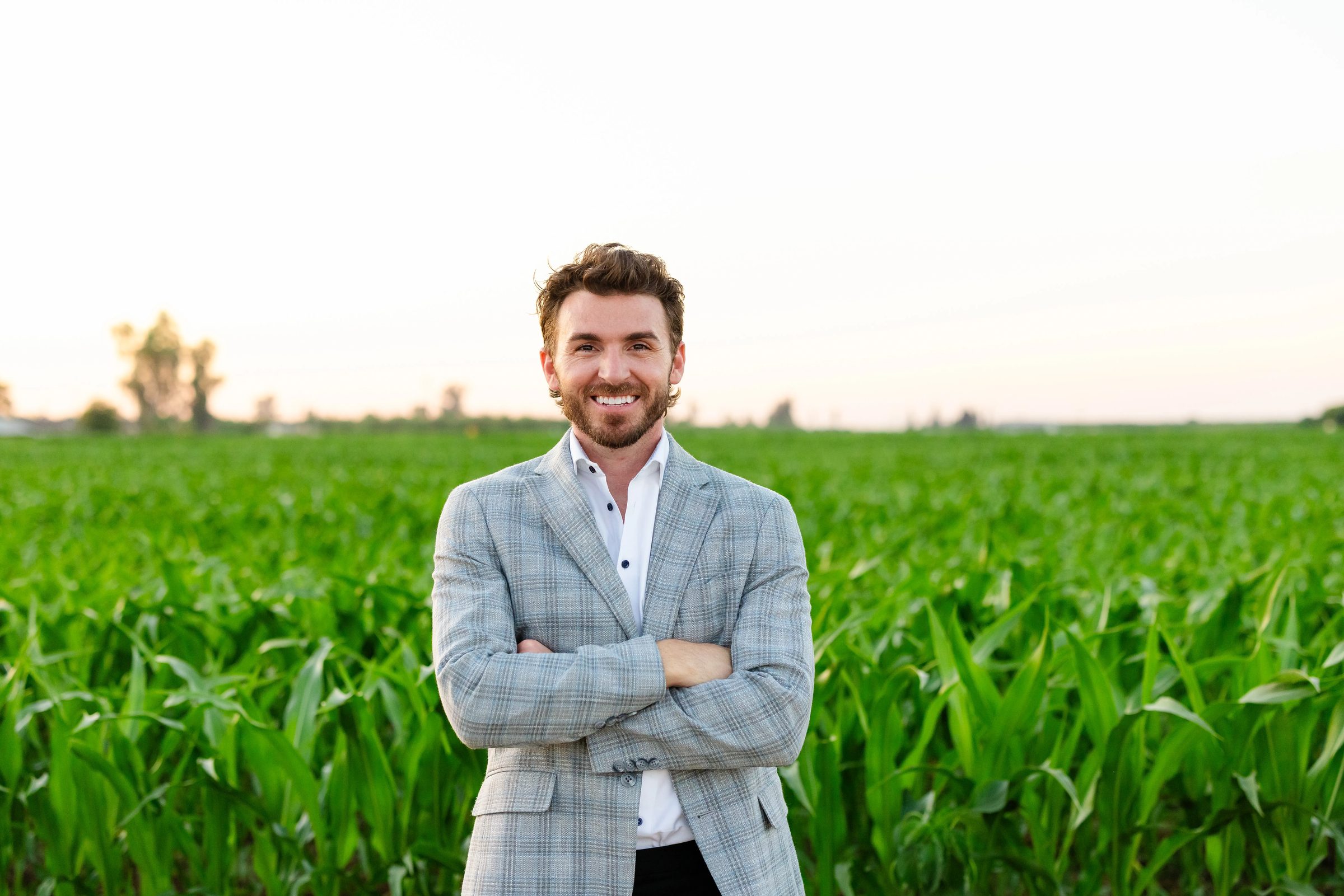 Theron Morgan standing in a Central Valley farm field
